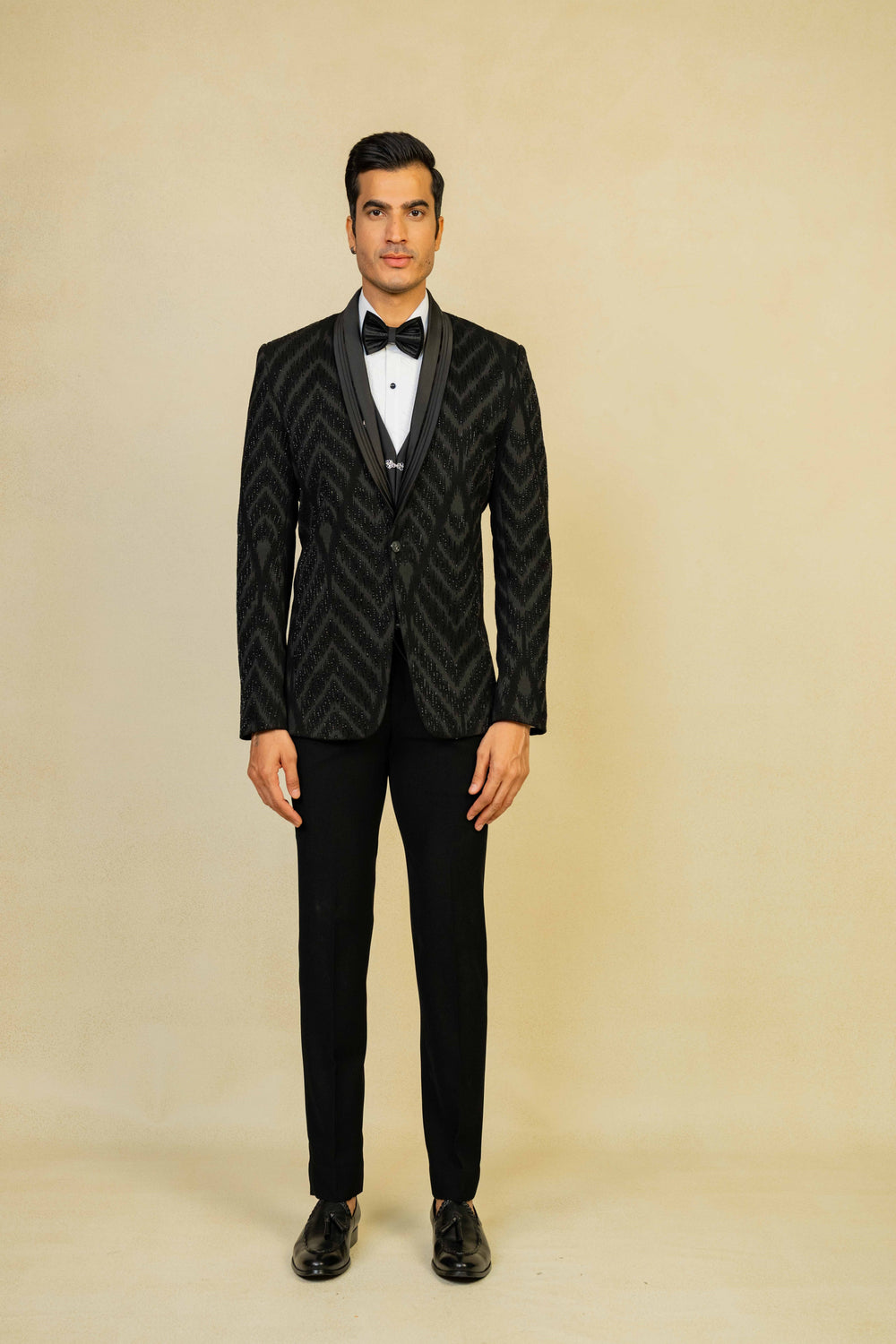 a black tuxedo with embroidery