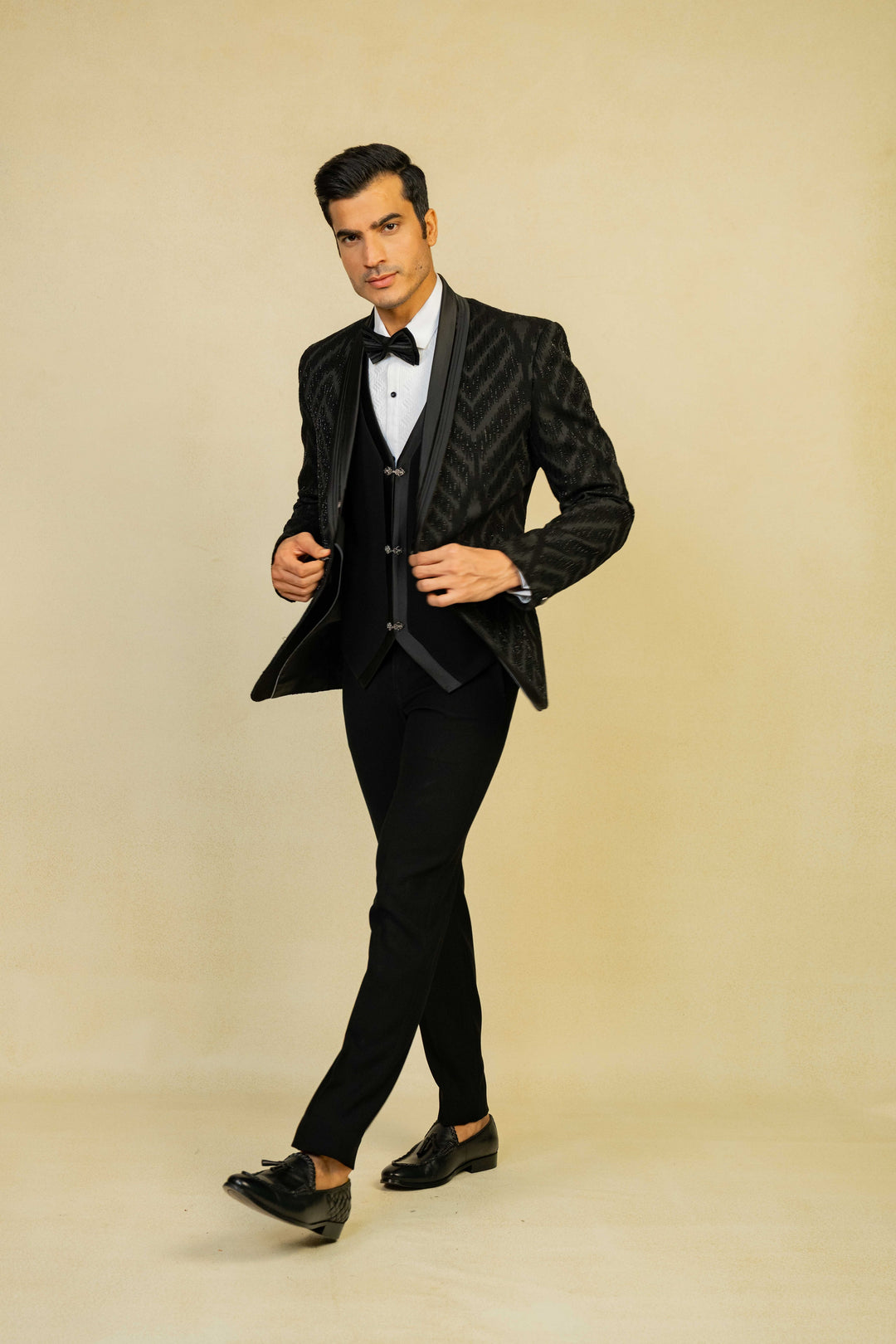 a black tuxedo with embroidery