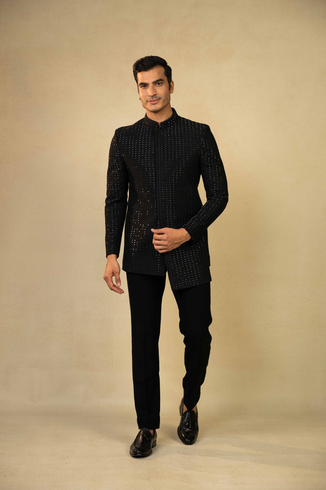 a black jodhpuri with hand embroidery