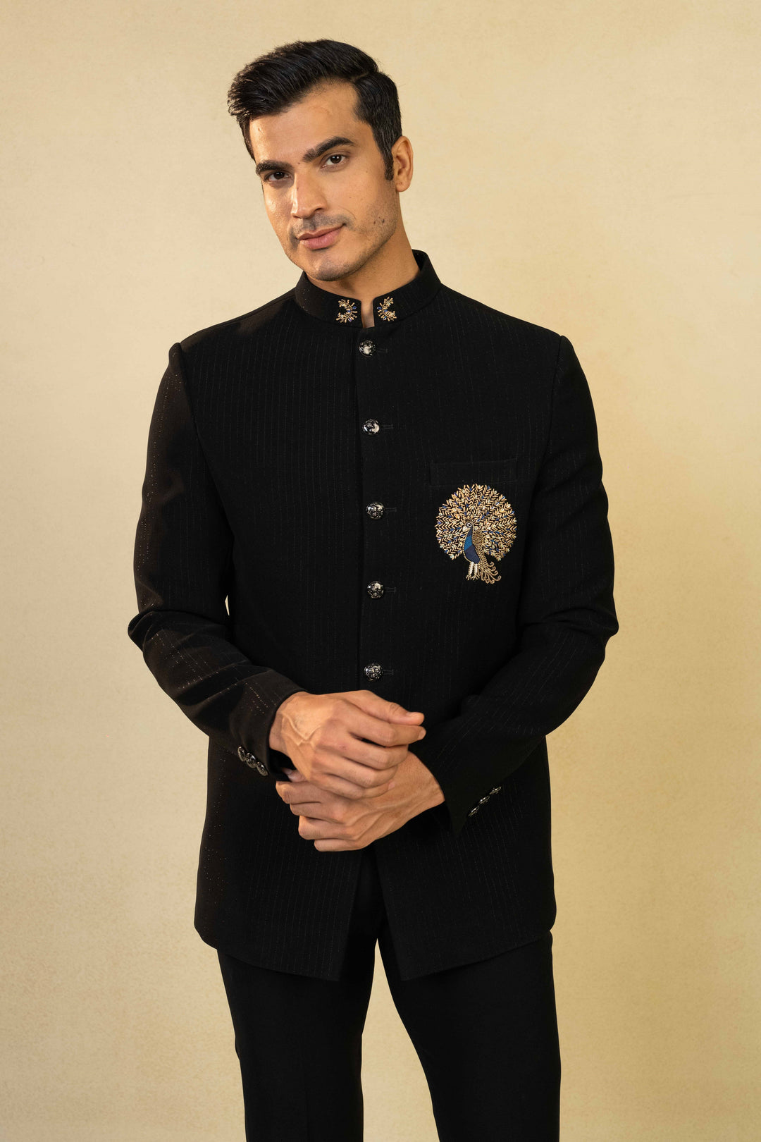 Classic Jodhpuri with intricate peacock motif in Zardozi and Resham embroidery.