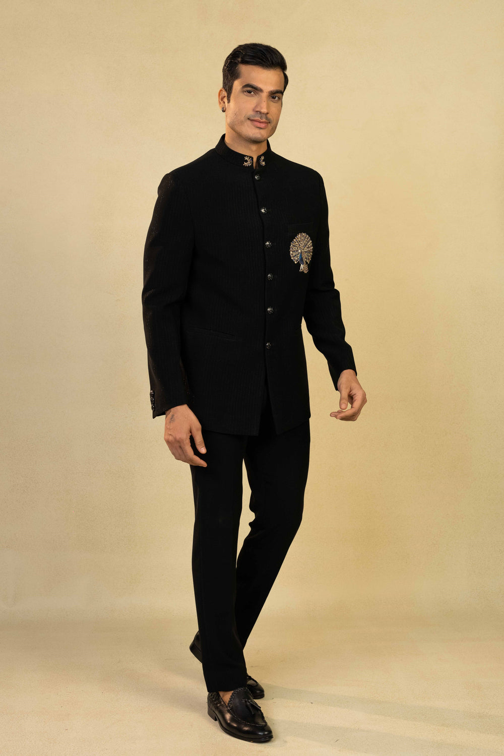 Classic Jodhpuri with intricate peacock motif in Zardozi and Resham embroidery.