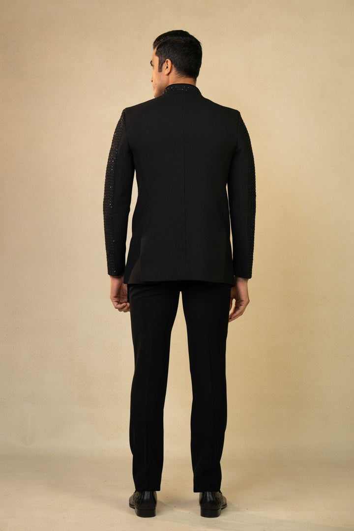 a black jodhpuri with hand embroidery