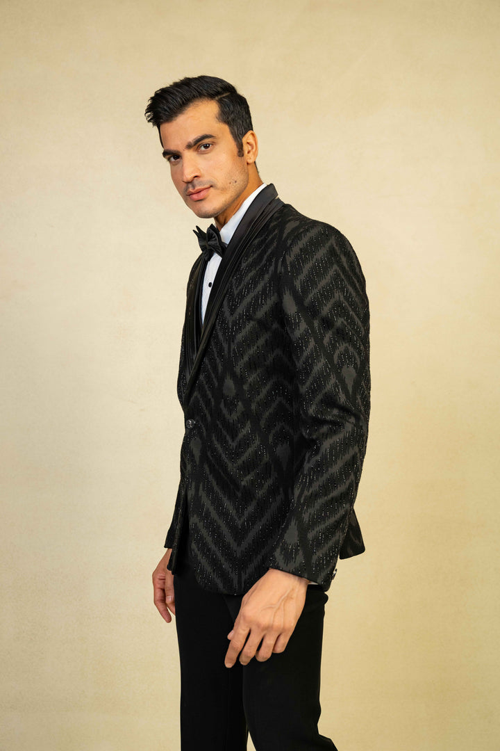 a black tuxedo with embroidery