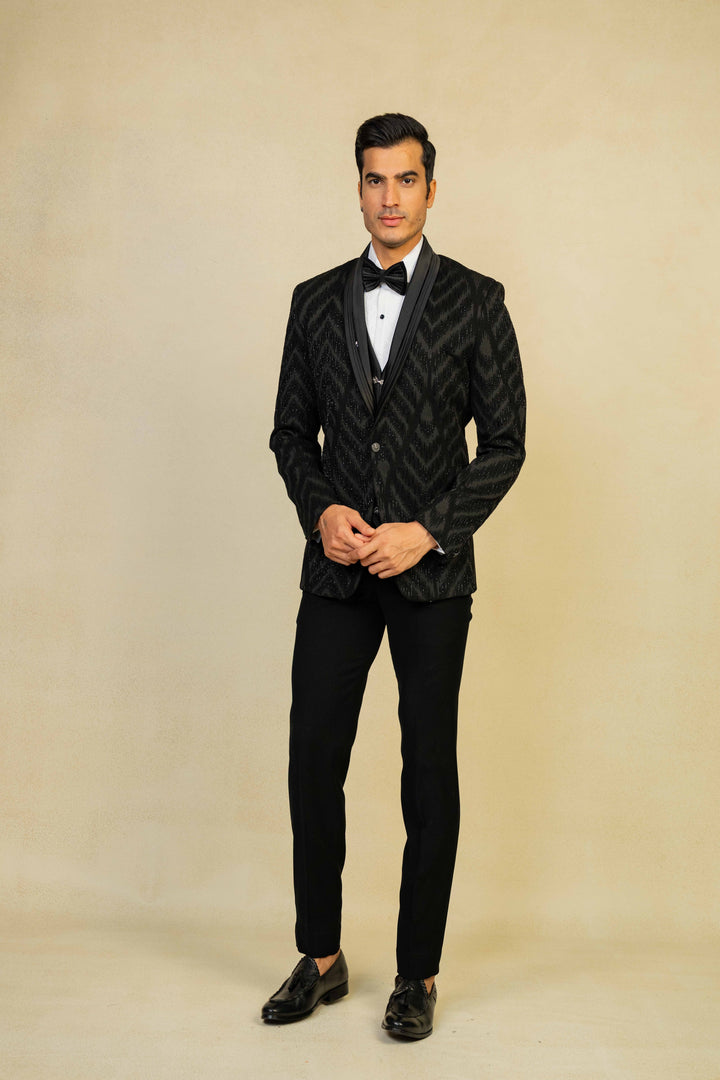 a black tuxedo with embroidery
