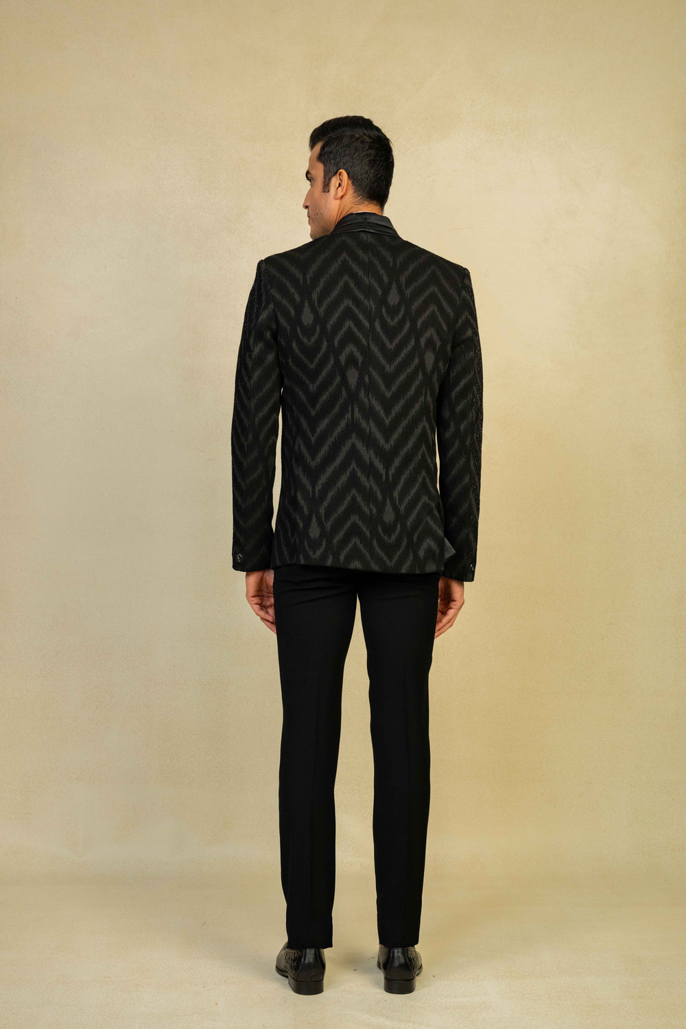 a black tuxedo with embroidery