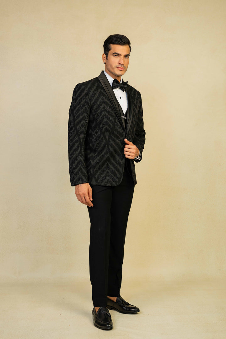 a black tuxedo with embroidery