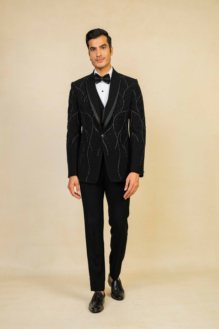 a black tuxedo with hand embroidery
