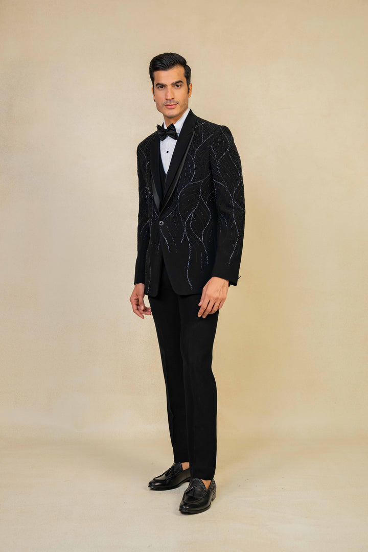 a black tuxedo with hand embroidery