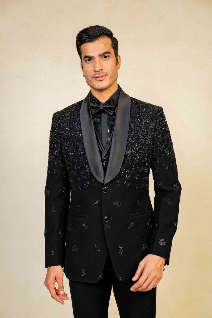 a blacktuxedo with abstract geometric embroidery