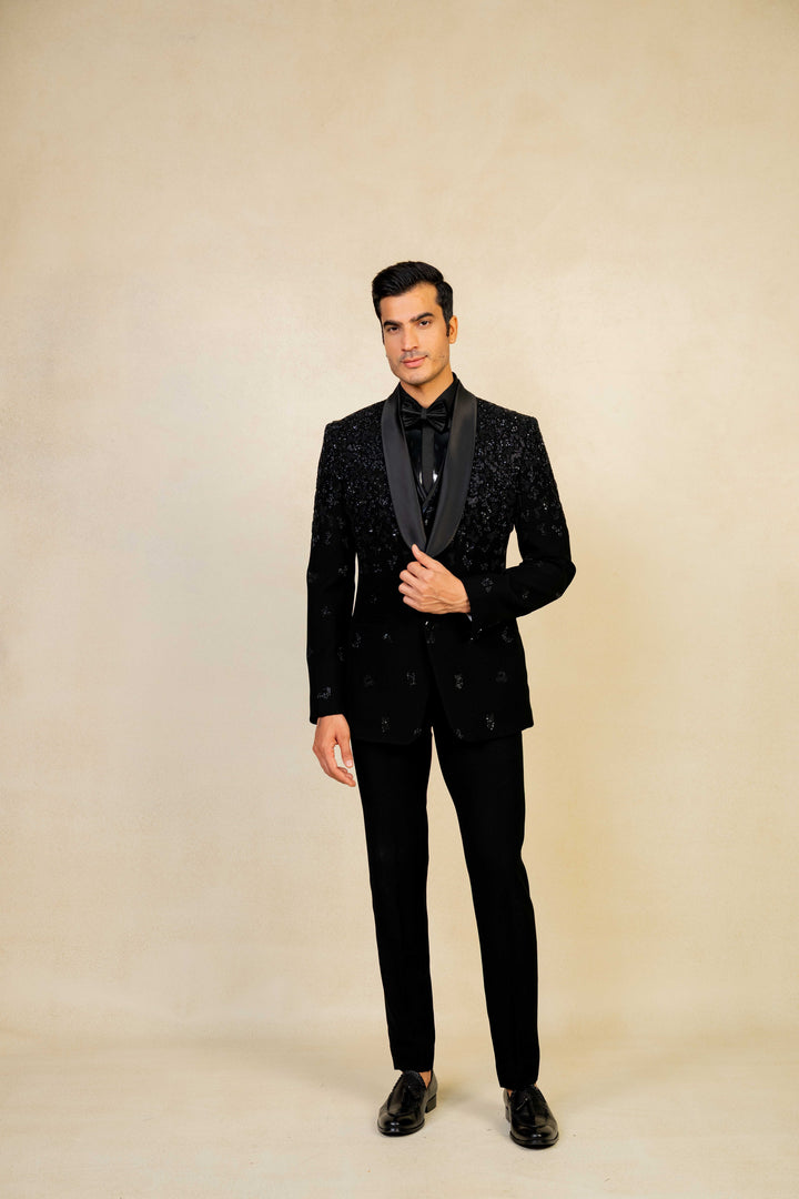 a blacktuxedo with abstract geometric embroidery