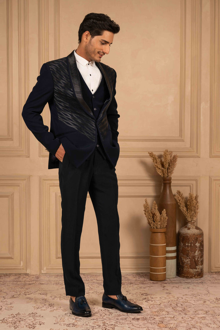 deep blue velvet tuxedo with metallic embroidery