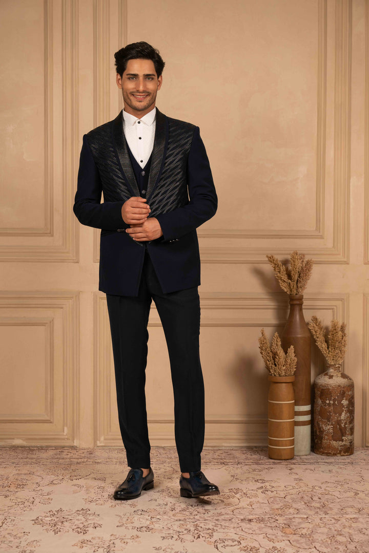 deep blue velvet tuxedo with metallic embroidery