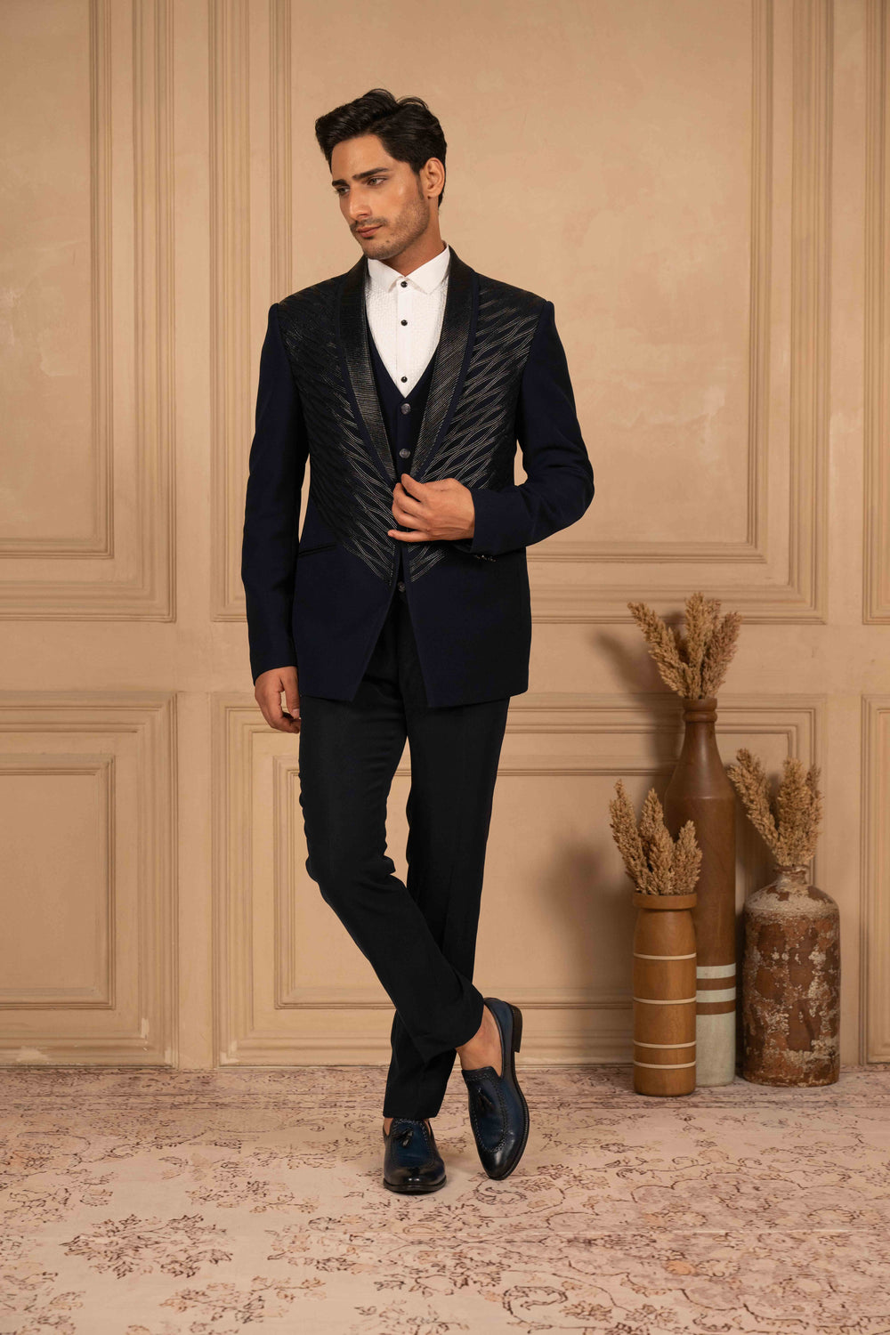 deep blue velvet tuxedo with metallic embroidery
