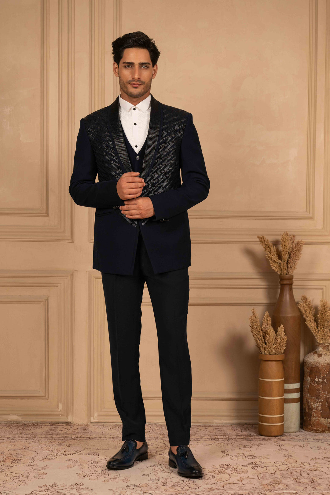 deep blue velvet tuxedo with metallic embroidery