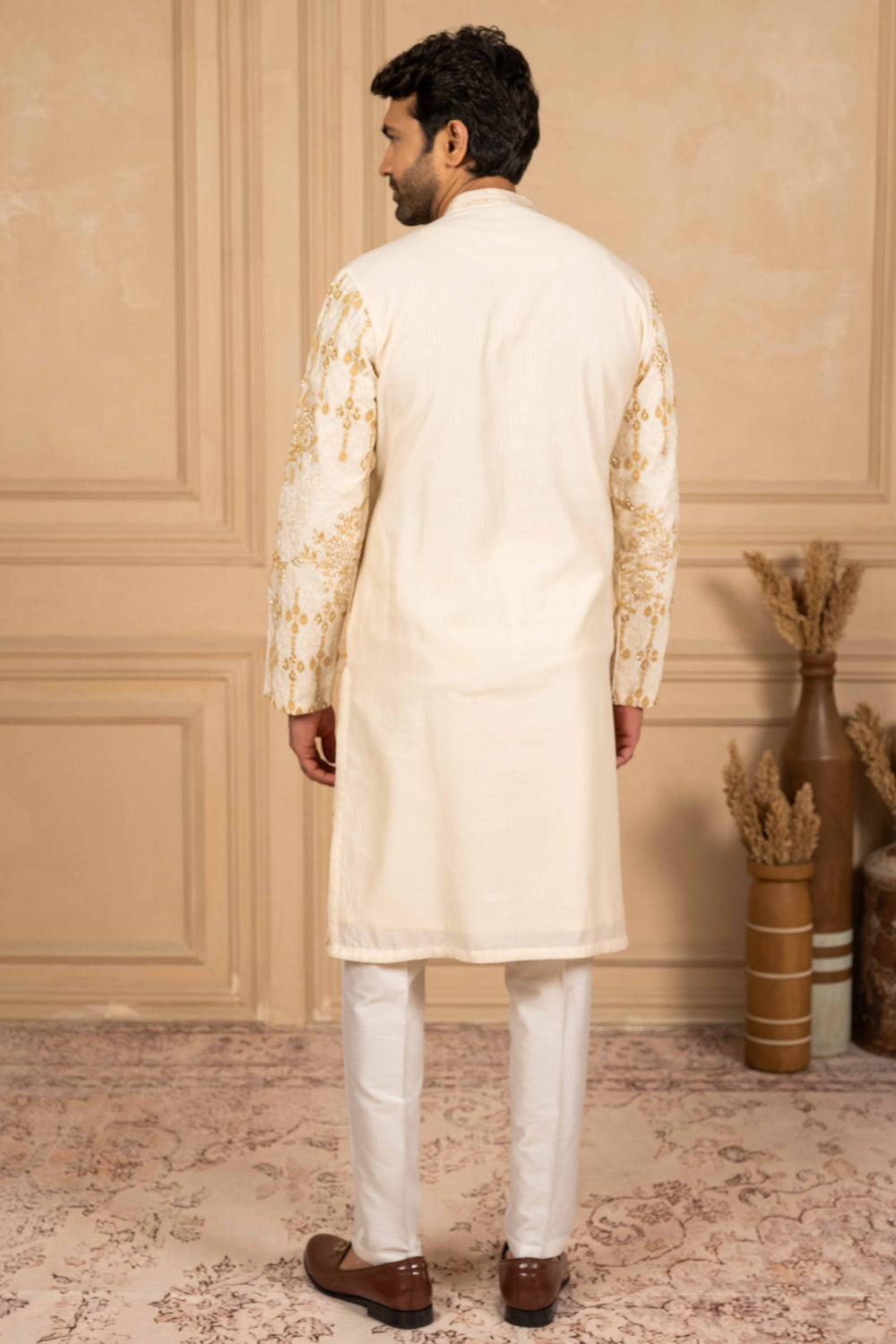 kurta with geo-floral motifs in Marodi and hand embroidery.