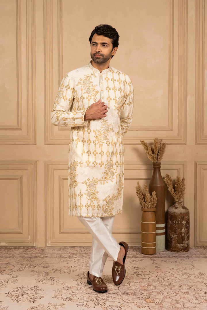 kurta with geo-floral motifs in Marodi and hand embroidery.