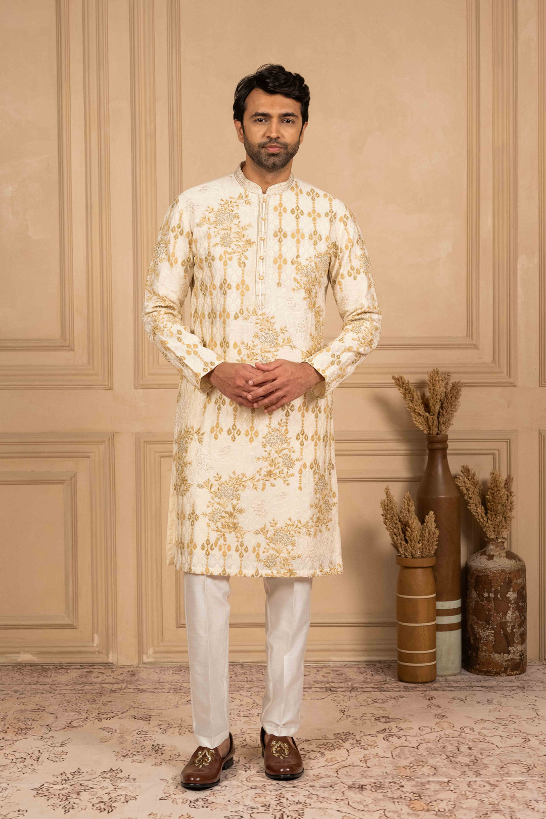 kurta with geo-floral motifs in Marodi and hand embroidery.